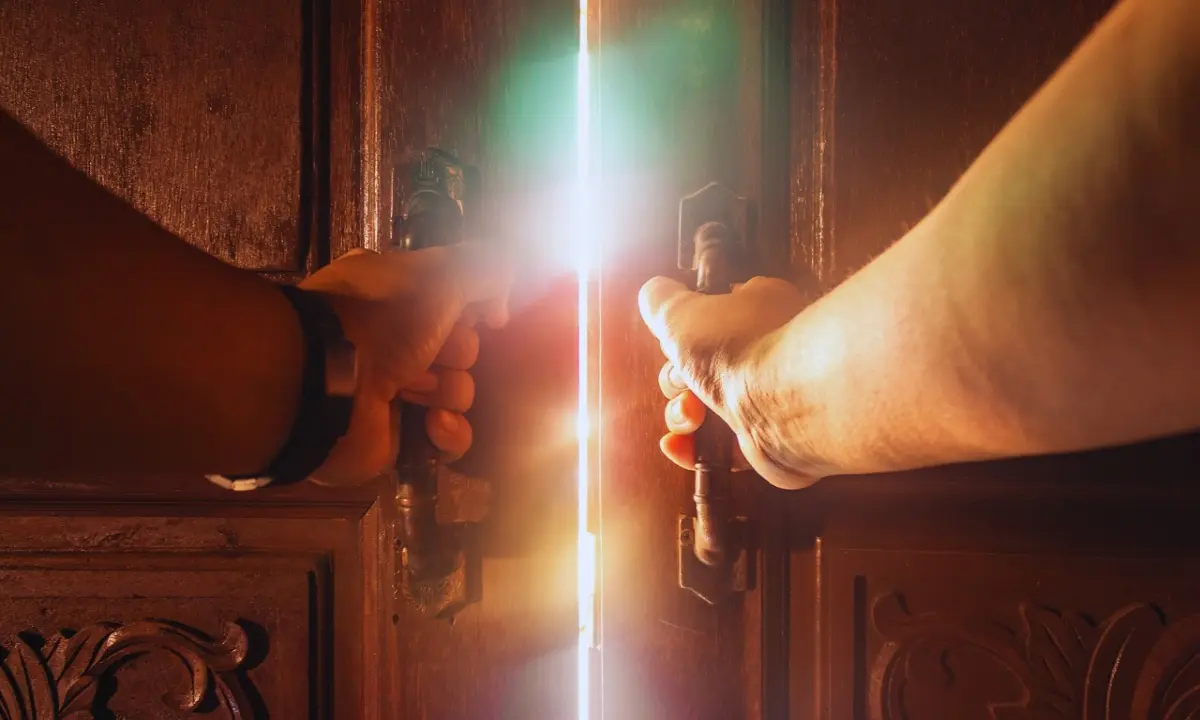 Opening door to new opportunities, stepping into the light of growth and self-discovery, symbolic of overcoming fears and embracing the unknown.