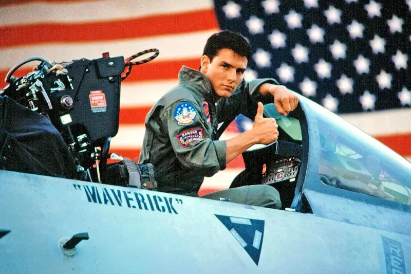 Image still from the movie Top Gun (1986), showing Tom Cruise aboard an F-14 Tomcat