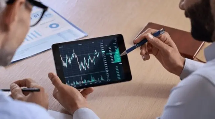 Person learning crypto safely with wallet apps and practical guidance.”