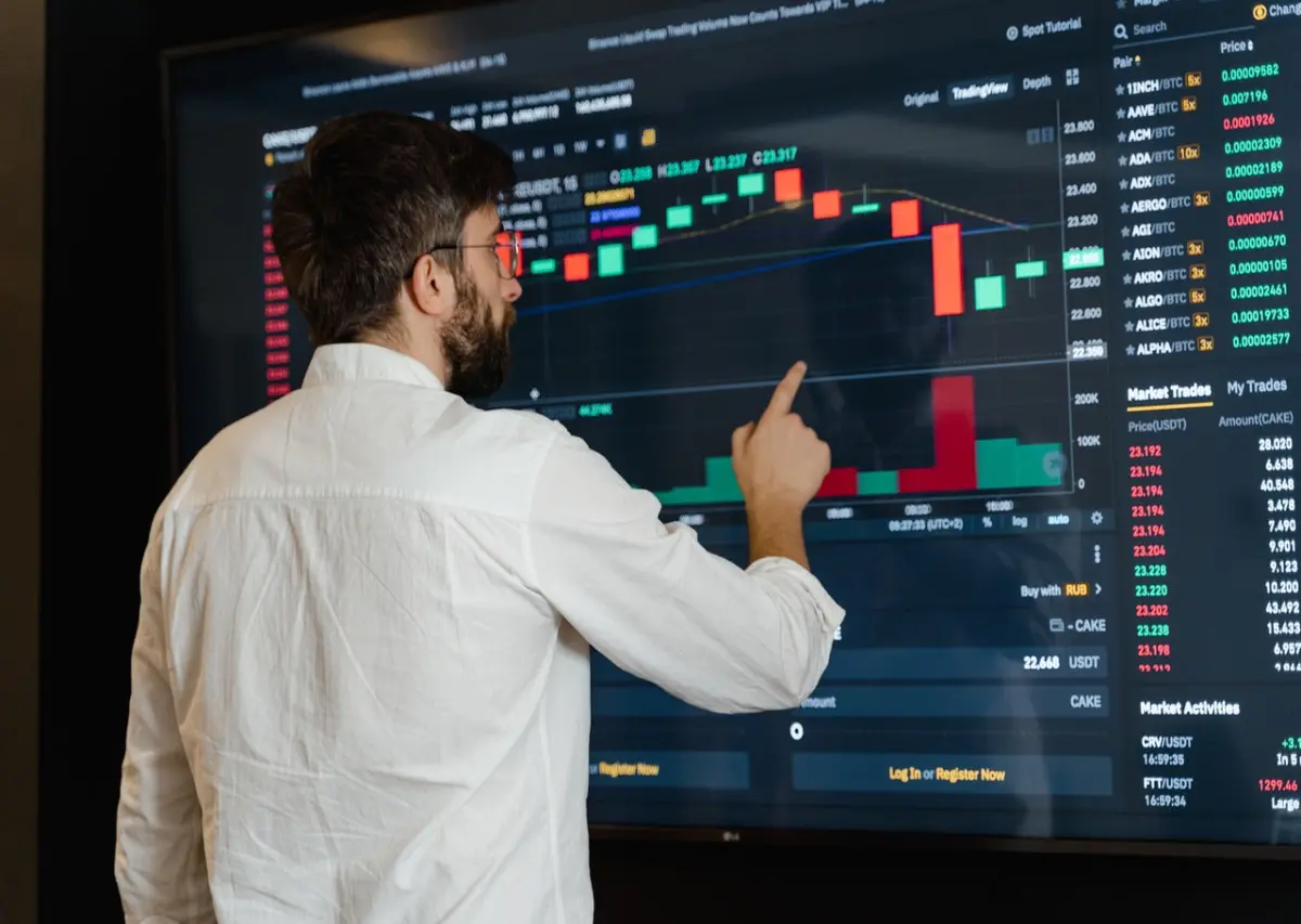 “Person reading crypto guides or learning on a tablet, symbolizing knowledge growth”