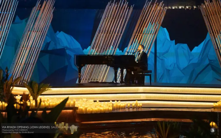 Via Riyadh 2023 opening gala. Production design: Patrick Larsen / Studio Bound, produced by Five Currents and Dragone. The first of three Saudi commissions — an opening gala designed to be invisible, where the design succeeded by disappearing.