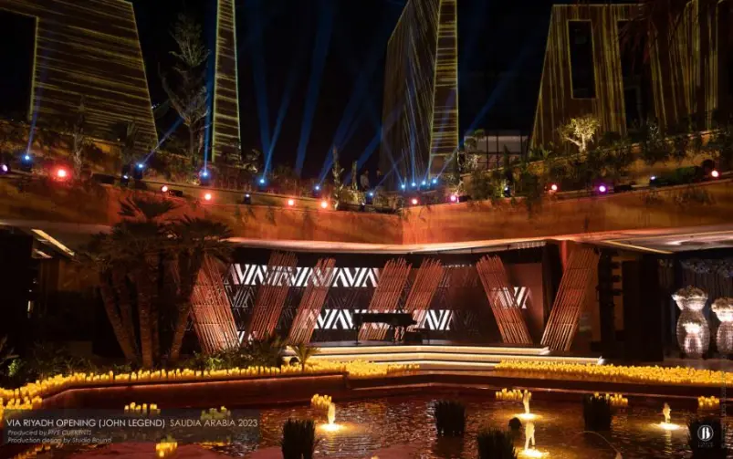 Via Riyadh 2023 opening gala. Production design: Patrick Larsen / Studio Bound, produced by Five Currents and Dragone. The first of three Saudi commissions — an opening gala designed to be invisible, where the design succeeded by disappearing.