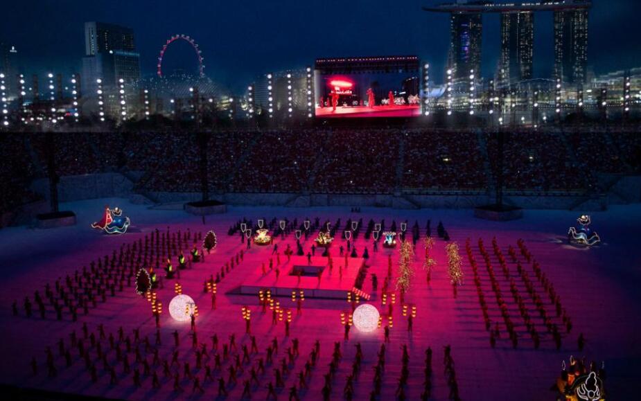 Singapore National Day Parade 2019, the Padang. Production design: Patrick Larsen / Studio Bound. Creative direction: Dick Lee. Three simultaneous audiences — live, broadcast, and diaspora.