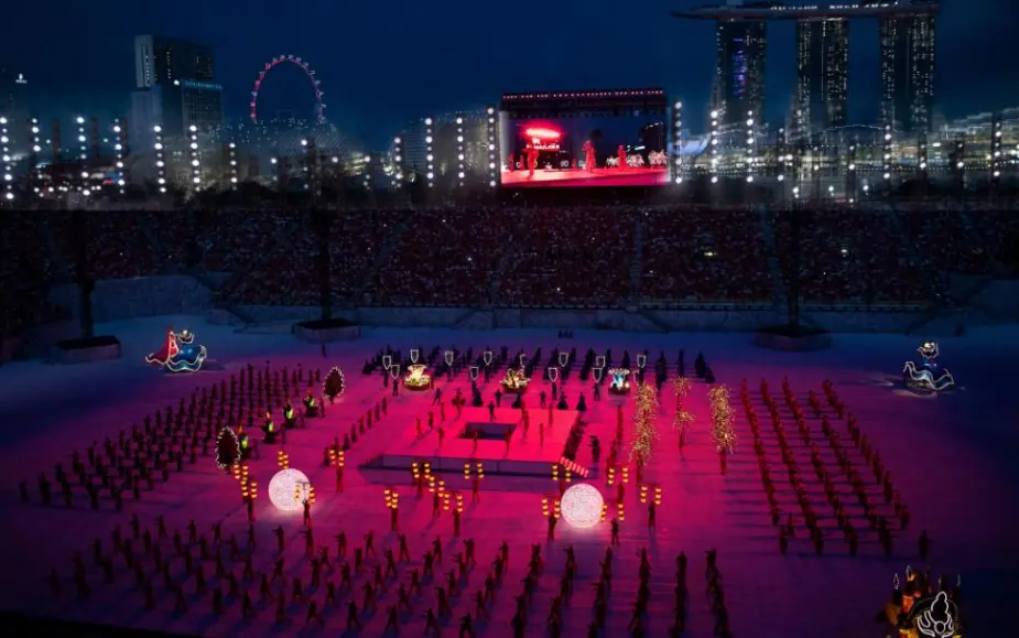 Singapore National Day Parade 2019, the Padang. Production design: Patrick Larsen / Studio Bound. Creative direction: Dick Lee. Three simultaneous audiences — live, broadcast, and diaspora.