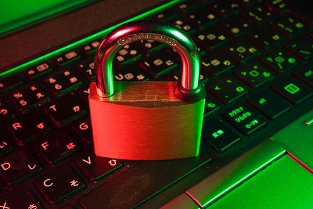 Padlock on a laptop keyboard symbolizing cybersecurity