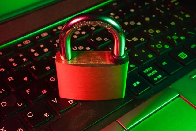 Padlock on a laptop keyboard symbolizing cybersecurity