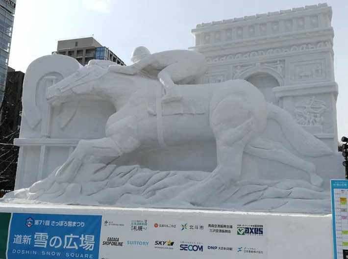 snow horse rider sculpture