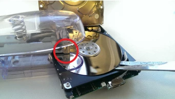 Place Stapler over Disk and Body