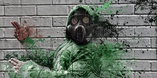 Paint on brick wall of guy in gas mask