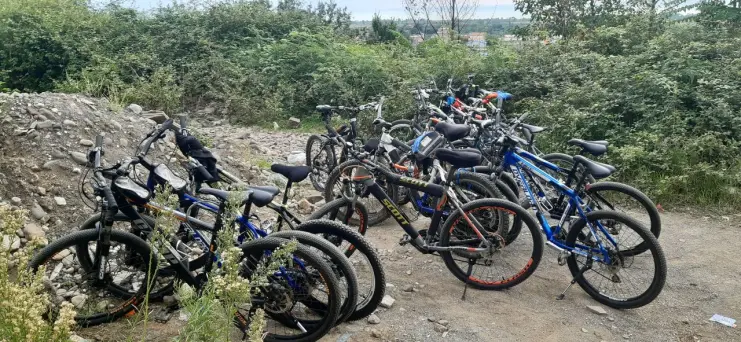 Crossing the Bike Through Water Pits