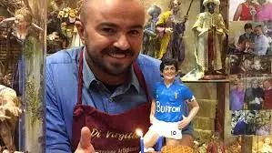 A Maradona-shaped puppet. Puppets like this are used in Christmas time to represent the birth of Christ, Napoli's ones are very famous for they irony and variety