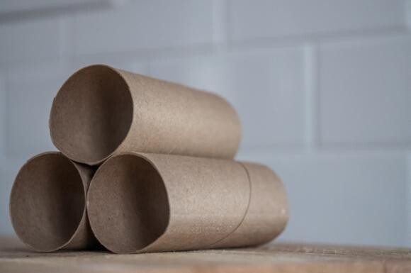 three empty toilet paper rolls