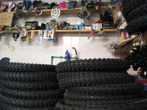 Photography of Cycling, The Story of Repairmen & a Friend