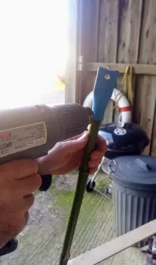 heating the plastic over the bamboo