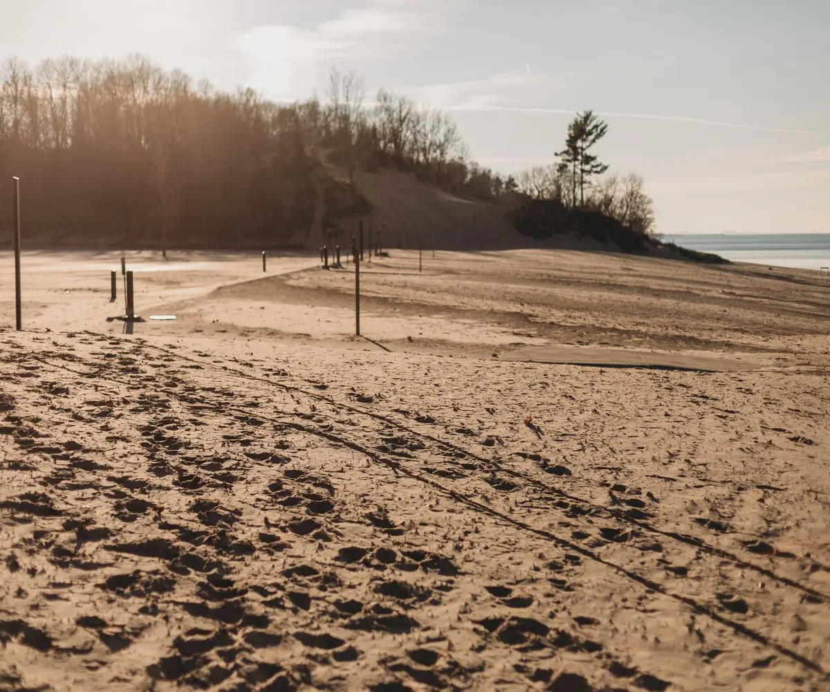 Sun set at the indiana dunes and long shadows on the beach