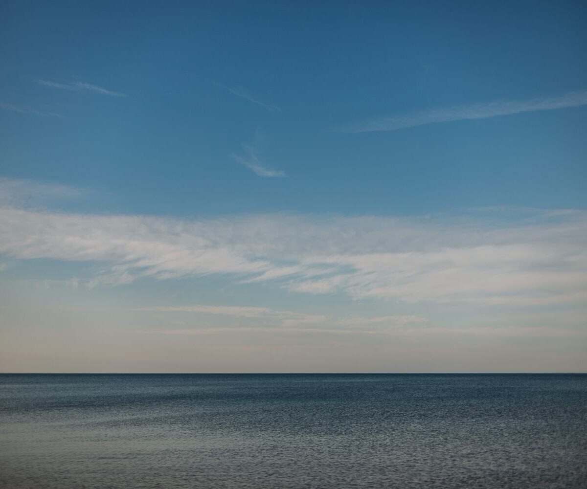 lake michigan tranquil on a peaceful day with plenty of blue sky