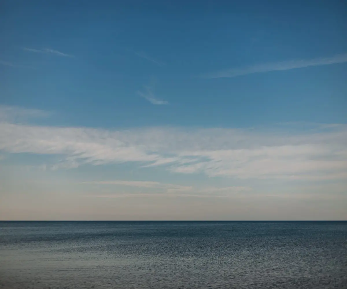 lake michigan tranquil on a peaceful day with plenty of blue sky