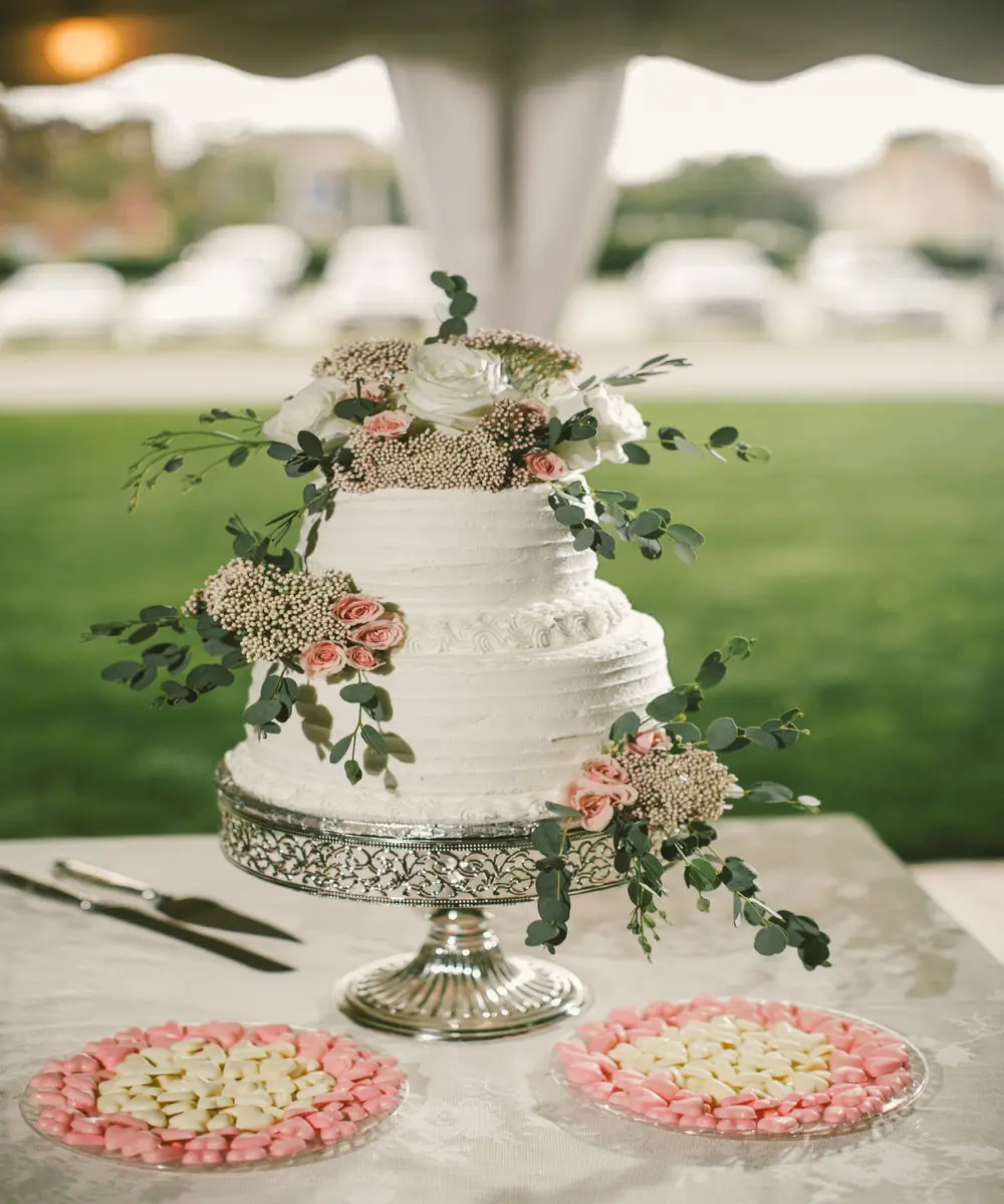 wedding cake in a tent outside