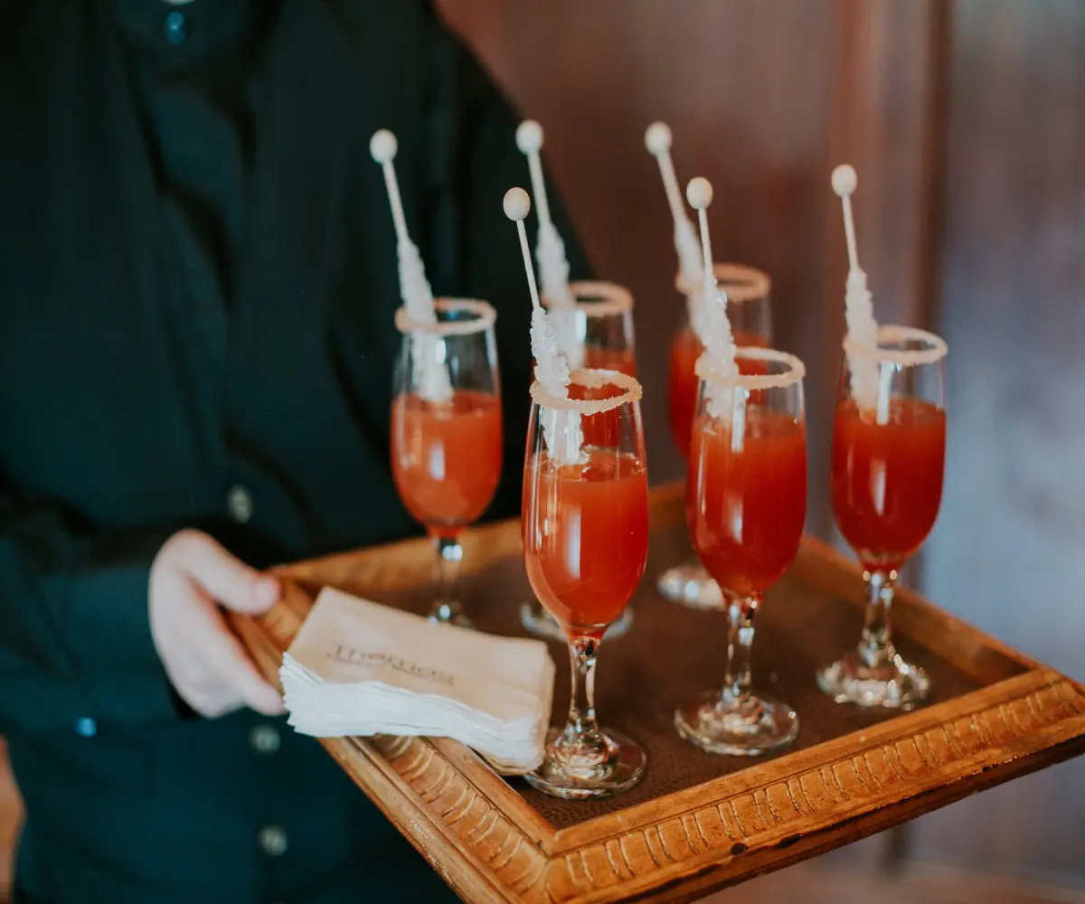 tray of red drinks