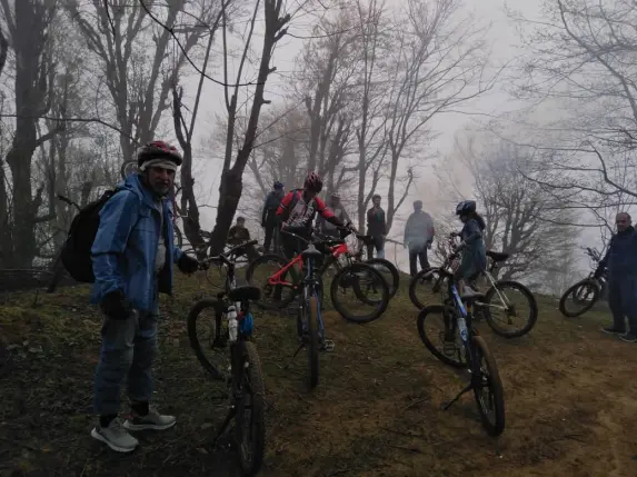 Mountain’s Fog, Pristine Nature and A Group of Cyclists