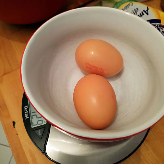 Crack and add 2 eggs to the mix.