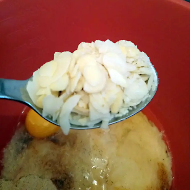 Add the sliced almonds to the mix.