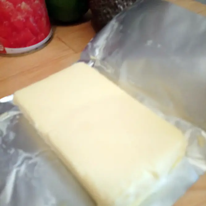 Add the melted butter to the mix.