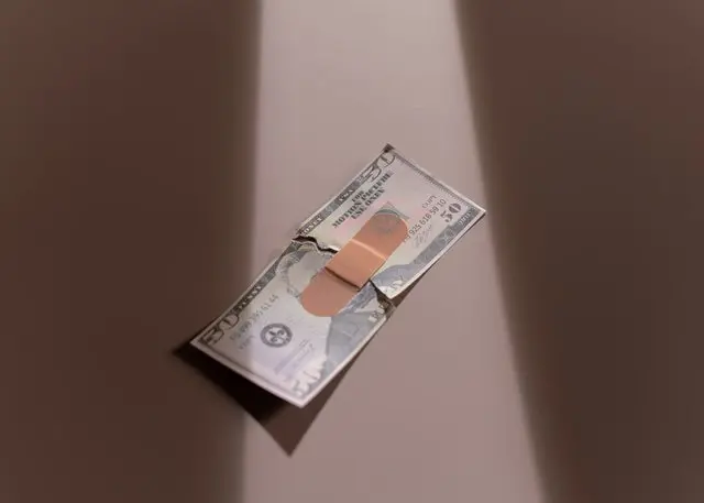 band-aid on money