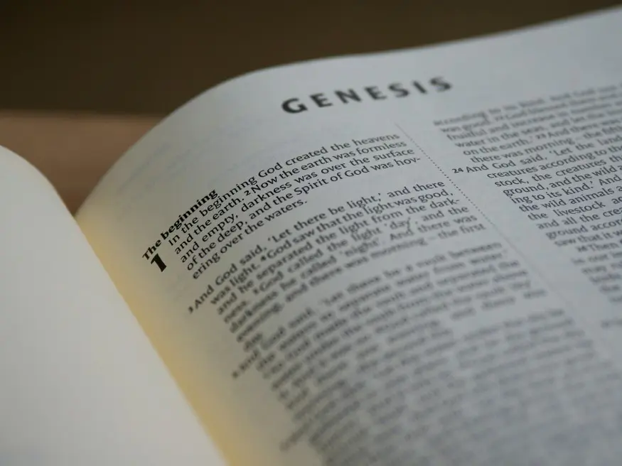 Picture of a Bible opened to Genesis 1