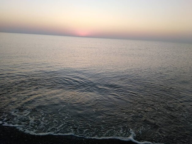 Sunrise, & The Fishing Boat Abandoned among Motionless Waters