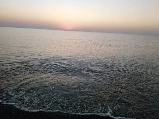 Sunrise, & The Fishing Boat Abandoned among Motionless Waters