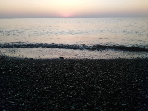 Sunrise, & The Fishing Boat Abandoned among Motionless Waters
