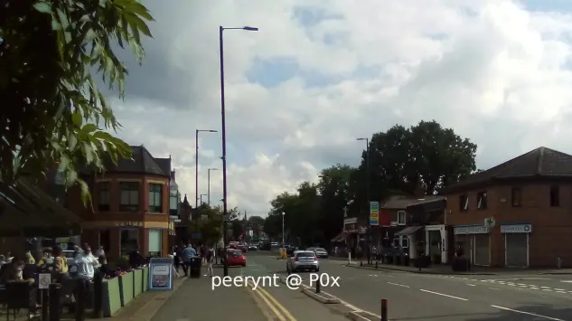 A street in Didsbury, Manchester with pubs, restaurants and cafes.