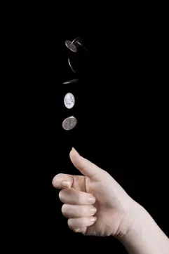 Tossing a coin resulting in head or tail with each outcome given by 50% chance