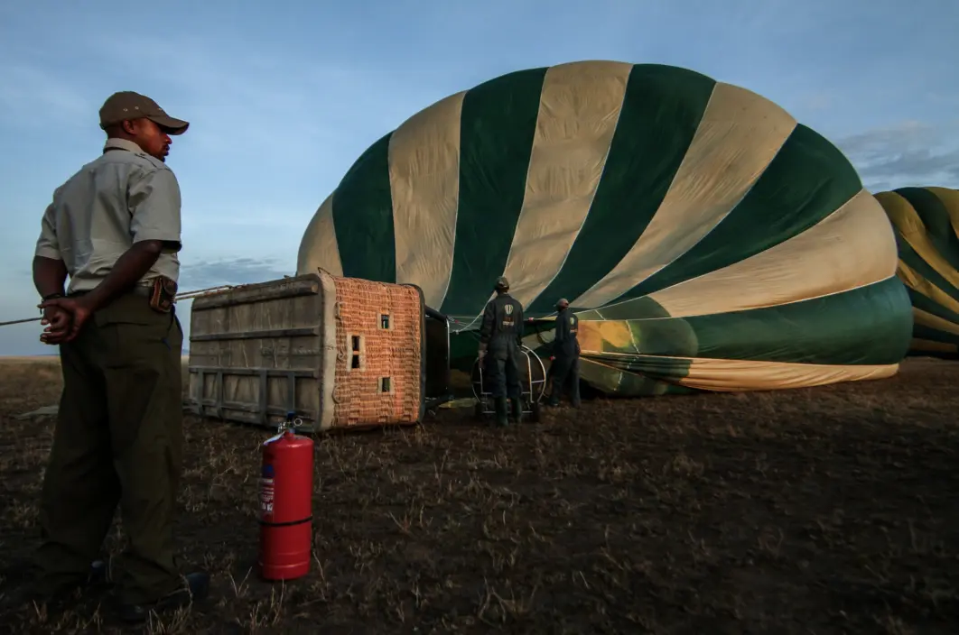 A guard watching Safari Balon ride being prepared
