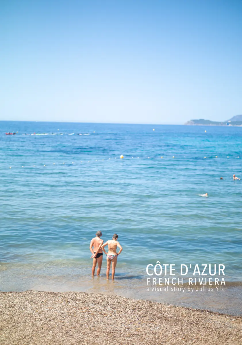 A couple enjoy the warm sea water in French Riviera