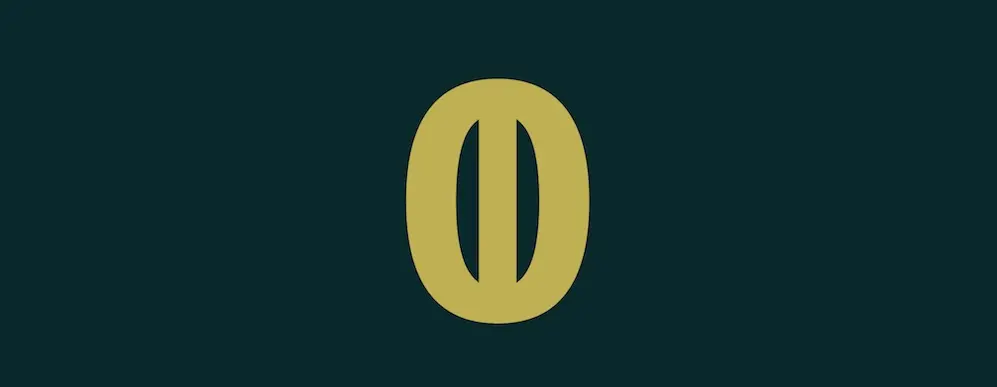 zero with a one through it in gold text with black background