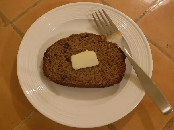 sliced banana bread with butter