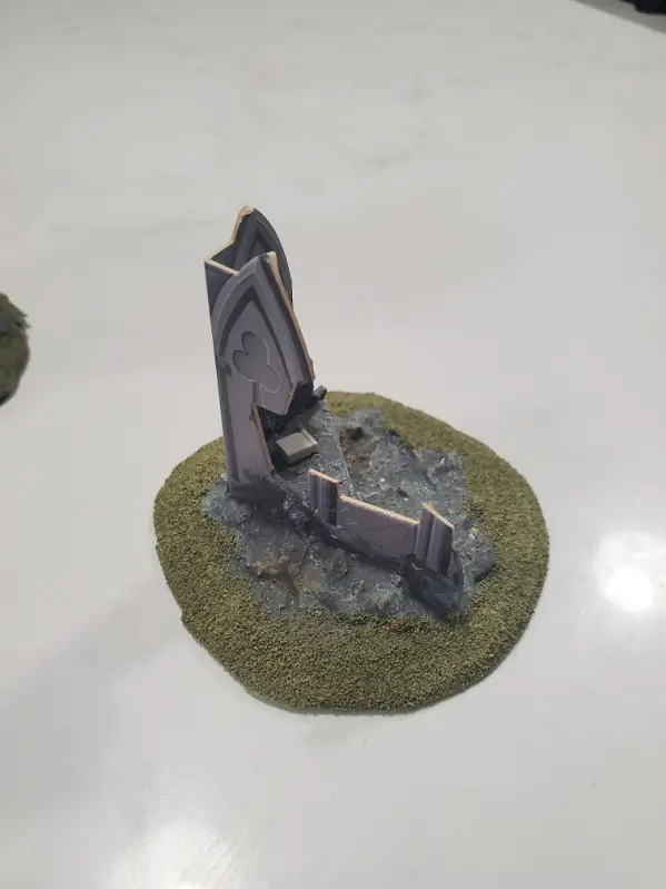A Gothic cathedral fortification mounted on a base