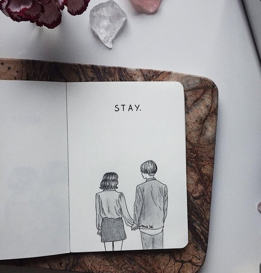 A man and women holding hands captioned
