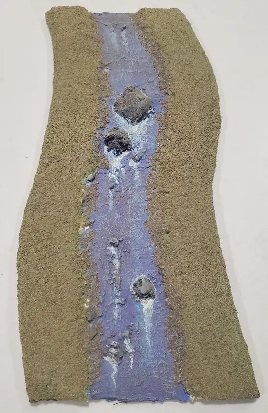 A modular section of river for battlefield miniature scenery