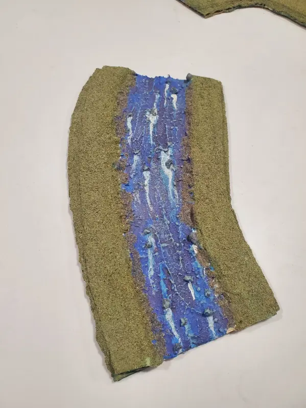 A part of the modular river. This river is about 23 cm long and 9 wide.