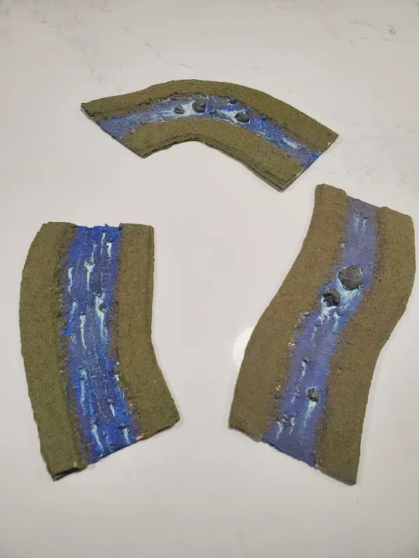 All three sections of the modular river for war gaming