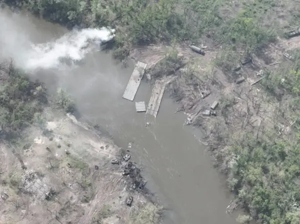 Russian military vehicles after a failed river crossing