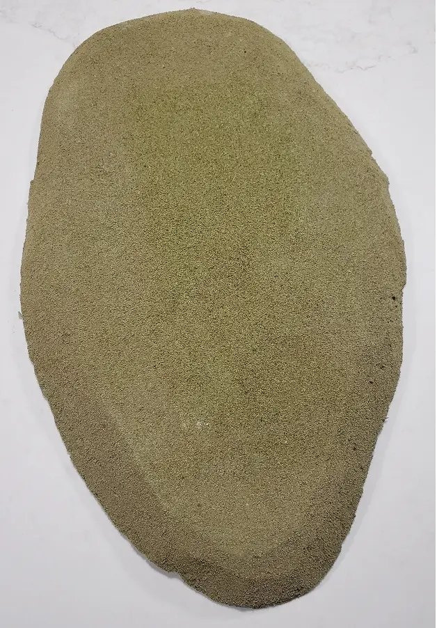 A large hill covered with grass flock for tabletop gaming (details)