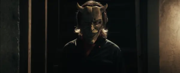 Ethan Hawke as Grabber wearing a mask in The Black Phone movie
