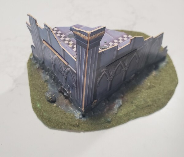 A Gothic cathedral fortification mounted on a base