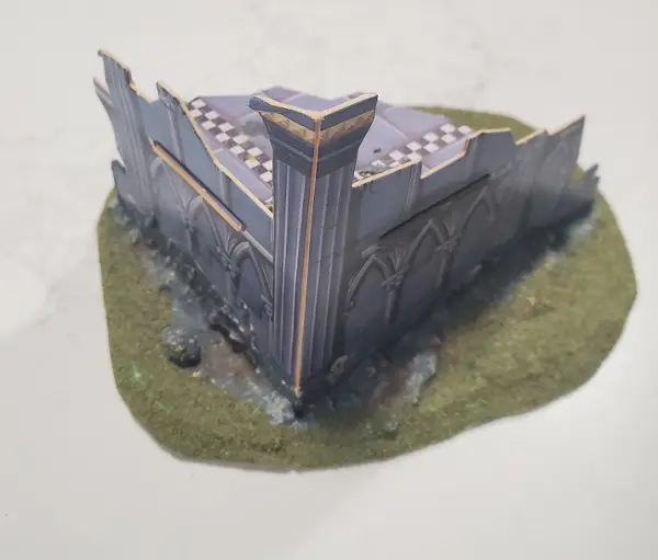 A Gothic cathedral fortification mounted on a base