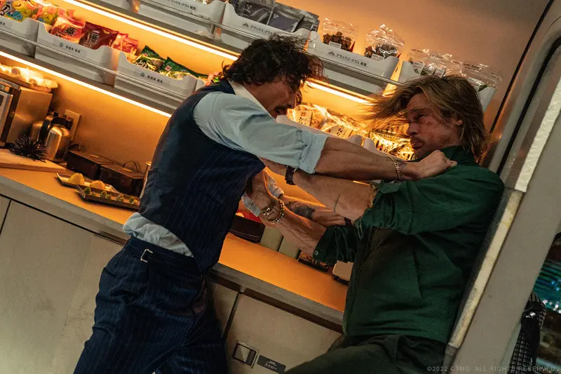 Aaron Taylor-Johnson and Brad Pitt in Bullet Train movie.