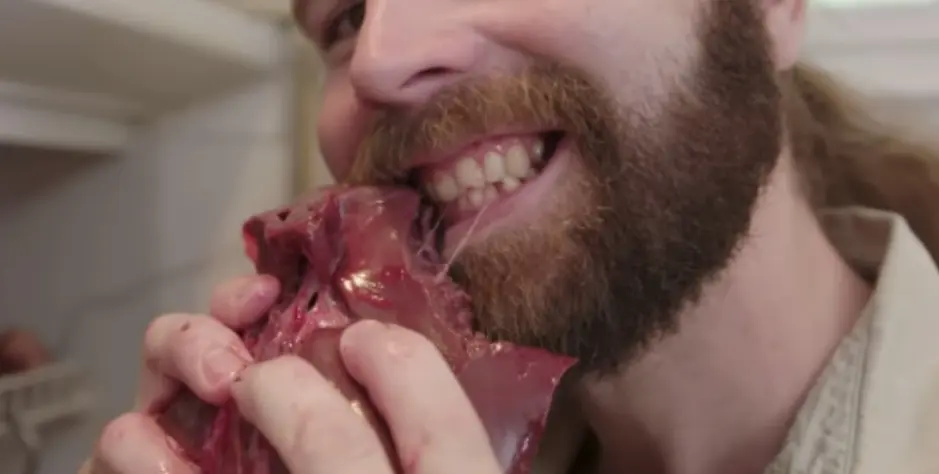 Man Eating Raw Meat